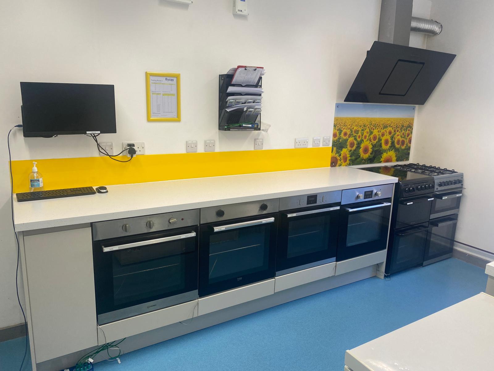 Row of domestic ovens inside Byzas test kitchen